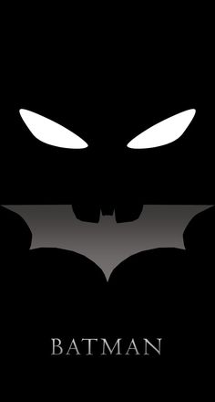 the dark knight batman logo with glowing eyes and fangs on it's face, in black