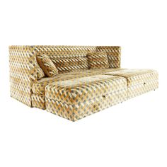 a couch that is sitting on top of a white surface with yellow and brown patterns