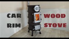 an old fashioned stove sitting on top of a wooden floor next to a sign that says wood stove