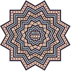 a circular quilt is shown in red, white and blue colors on a white background