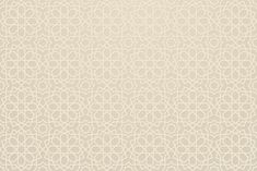 a beige wallpaper with an intricate pattern on it's surface, as well as the