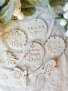 christmas ornaments are arranged on a table