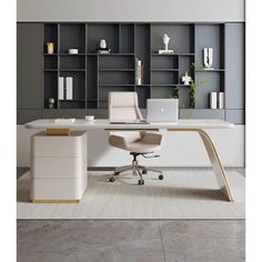 an office desk with two chairs and a laptop on it in front of a bookcase