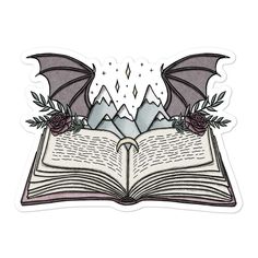 an open book with a dragon flying over it and mountains in the background, surrounded by leaves