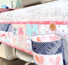 a close up of a wooden bench with fabric on it