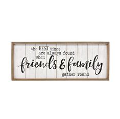 a wooden sign that says friends and family