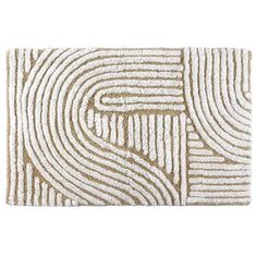 a white and beige rug with wavy lines on it