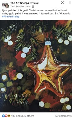 an image of a christmas ornament hanging from a tree