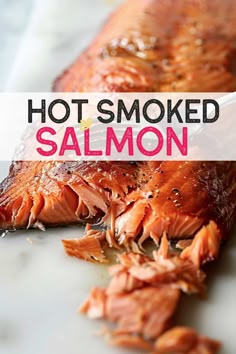 smoked salmon on a white plate with text overlay that reads, hot smoked salmon