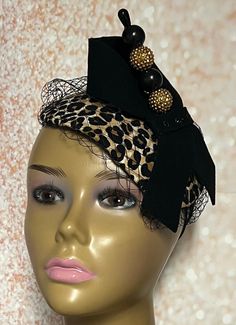 Leopard Teardrop Fascinator Half Hat for Tea Party, Church Head Covering, Wedding, and other Special Occasions  Cocktail Fascinator with net/veiling, hatpin and felt bow. Perfect for engagement parties, mother of the bride, anniversary, etc. The hatpin is for decorative purposes only. Suitable for all seasons: summer, fall, winter, and spring. Handmade Measures:  6X8 inches  SHIPPING All items for free shipping will be shipped via USPS FIRST CLASS MAIL. Vintage Black Fascinator For Party, Party Fascinator With Matching Headband And Pinched Crown, Gatsby Style Party Headband Hat, Fitted Evening Fascinator Headband, Vintage Fitted Headpieces For Party, Fitted Evening Headband Fascinator, Elegant Mini Party Hats With Pinched Crown, Evening Fitted Headband Fascinator, Fitted Evening Headband