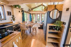 a kitchen and dining area in a tiny home