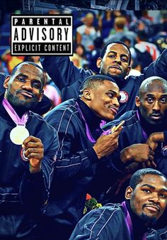 the basketball team is posing for a photo with their gold medals in front of an audience