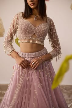 Roqa Lily Pink Lehenga Set | Indiaspopup.com – INDIASPOPUP.COM Sister Of The Bride Indian Outfits, Reception Lehenga Blouse Designs, Pink Net Blouse Designs, Bride's Sister Dress, Lehenga For Bride's Sister Indian, Wedding Lehenga For Brides Sister, Lehengas For Bride Sister, Designer Blouse For Lehenga, Moti Work Blouse Designs