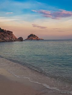 the beach is clean and empty at sunset