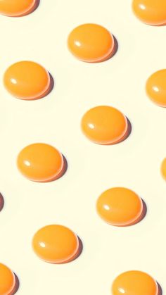 an orange and white background with circles