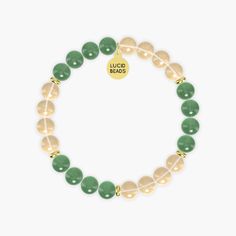 This bracelet named Success Manifestation combines the vibrant energy of Citrine with the soothing properties of Aventurine. Citrine, known as the 'merchant's stone', is associated with success, prosperity, and abundance. Its sunny yellow color promotes positivity and motivation, helping to manifest goals and dreams. Aventurine, with its calming green hues, is believed to attract luck and opportunities while enhancing creativity and confidence. Together, these gemstones create a harmonious blend Manifest Goals, Attract Luck, Aventurine Bracelet, Dream Bracelet, Success Manifestation, Bracelet Inspired, Prosperity And Abundance, Citrine Bracelet, Goals And Dreams