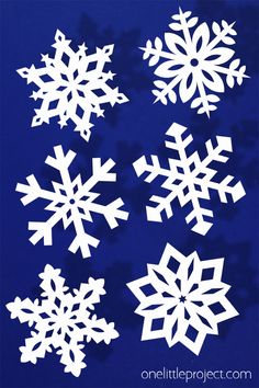 paper snowflakes on a blue background