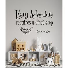 the children's playroom wall decal is decorated with blue lettering that says, every adventure requires a first step