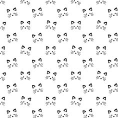 a black and white cat pattern with many different cats on it's face,