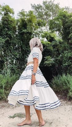 Inspired by the bright whites and contrasting blues of Santorini, Greece - this long-skirted, short-sleeved dress is what summer dreams are made of. Designed by women and all the right ingredients. Frolic and twirl your way through those summer weddings, family photoshoots, picnics and more with all the detailed gathers, ruffles, and trims, oh my! IG: @happilyeverlcp family photoshoot, family photo outfits summer, mommy and me fashion, family pictures, mom & daughter, neutral photoshoot Spring Vacation Short Sleeve Maxi Dress, Flowy Breezy Short Sleeve Maxi Dress, Flowy Short Sleeve Maxi Dress In Breezy Style, Breezy Flowy Maxi Dress With Short Sleeves, Flowy Breezy Maxi Dress With Short Sleeves, White A-line Short Sleeve Dress For Spring, White Tiered Skirt Maxi Dress For Vacation, Summer Bohemian Midi Dress With Short Sleeves, Bohemian Short Sleeve Midi Dress For Summer