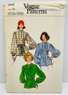 two women's blouses, one in blue and the other in green