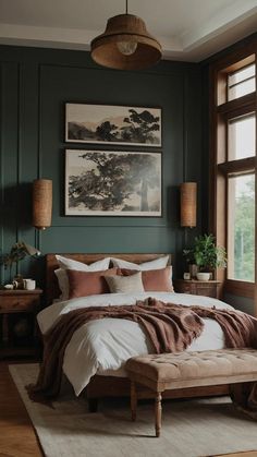 a large bed sitting in a bedroom next to two lamps and a painting on the wall