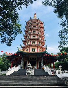 a pagoda with steps leading up to it