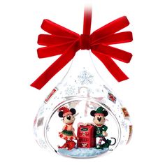 mickey and minnie mouse christmas ornament with red ribbon on white backgroung