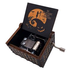 a music box with an image of a jack - o'- lantern on it