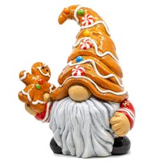 a ceramic figurine of a gnome with gingerbreads and candy canes