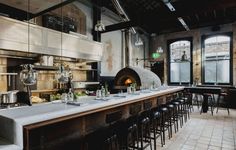 a large kitchen with an oven and lots of counter space