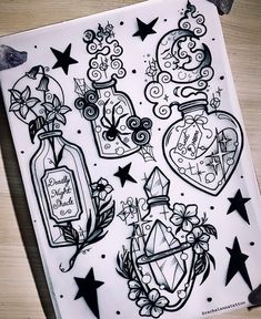 an ink drawing of some bottles and stars