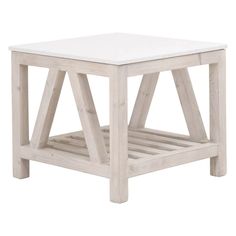 a white wooden table sitting on top of a white floor