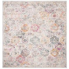 an area rug with many different colors and patterns on it, including pinks, oranges