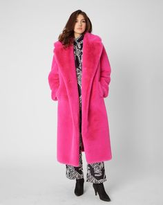 Chic Pink Spring Fur Coat, Chic Pink Fur Coat For Spring, Chic Pink Fur Coat For Fall, Luxury Faux Fur Spring Coat, Luxury Pink Long Sleeve Outerwear, Luxury Long Sleeve Pink Outerwear, Luxury Pink Winter Outerwear, Luxury Pink Outerwear For Winter, Pink Long Fur Coat For Fall