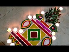 an artistic rang art work with candles and lights