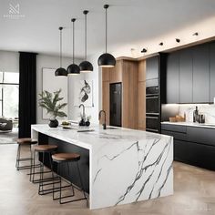 a modern kitchen with marble counter tops and black cabinets, along with bar stools