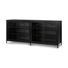 a black bookcase with glass doors on the top and bottom shelves, in front of a white background