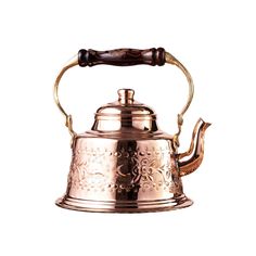 a metal tea kettle with a wooden handle on a white backgrounn background