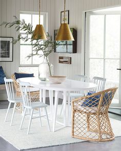 a white table and chairs in a room