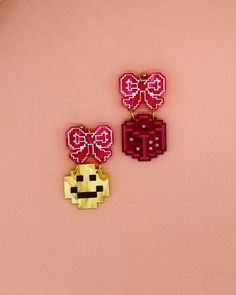 earrings with pink bow stud and one earring with a yellow smiley dangle and a pink dice dangle Dice Earrings, Calendar Notebook, Host Gifts, Cozy Gift, Acrylic Earrings, Top Gifts, Scarf Hairstyles, Hat Hairstyles, Smiley