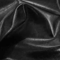 black leather textured up close to the surface