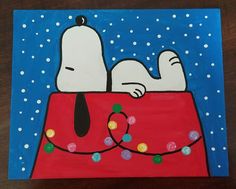 a painting of a dog sleeping on top of a red bag with christmas lights around it