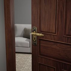 an open door with a couch in the background