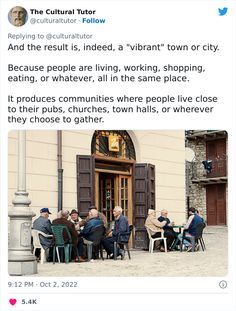 an image of people sitting at tables in front of a building with doors and windows