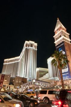 the las vegas hotel and casino is lit up at night