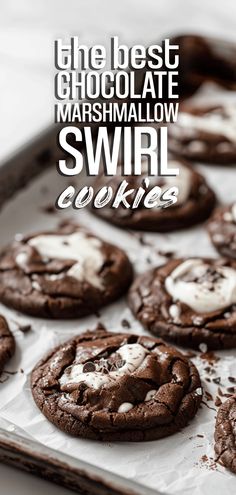 chocolate marshmallow swirl cookies on a baking sheet with the words, the best chocolate marshmallow swirl cookies