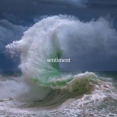 an ocean wave with the word sentiment written in white on it, and dark clouds above