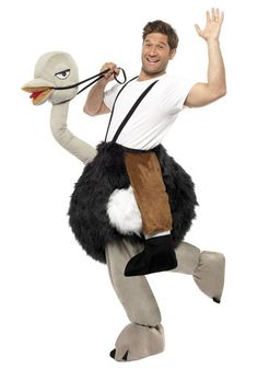 a man in an ostrich costume is holding a bird on his shoulder and smiling