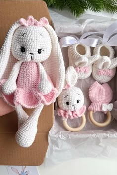 a crocheted bunny and other items in a box